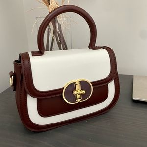 Structured top handle handbag